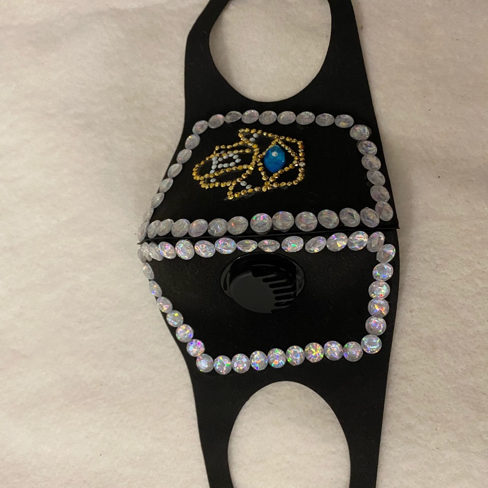 Hamsa rhinestone face mask.